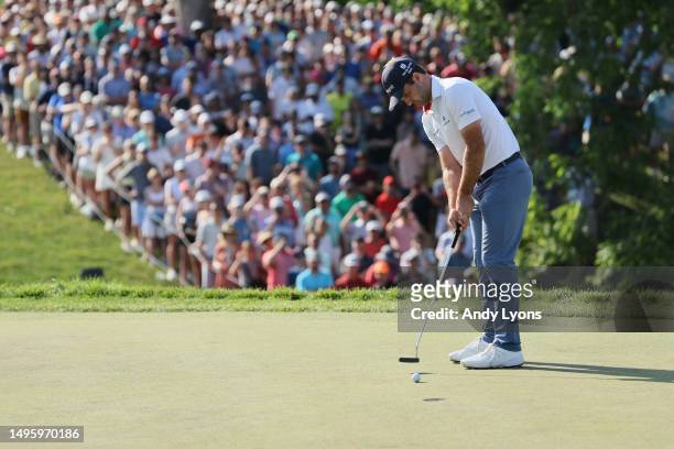 Denny McCarthy of the United States putts on the 18th green during the final round of the Memorial Tournament presented by Workday at Muirfield...