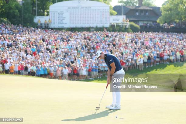 Viktor Hovland of Norway putts on the 18th green during a playoff in the final round of the Memorial Tournament presented by Workday at Muirfield...