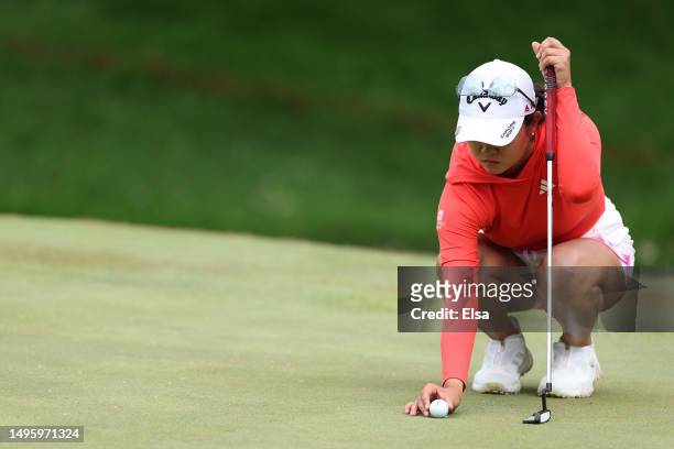 Rose Zhang of the United States lines up her putt on the fifth green during the final round of the Mizuho Americas Open at Liberty National Golf Club...