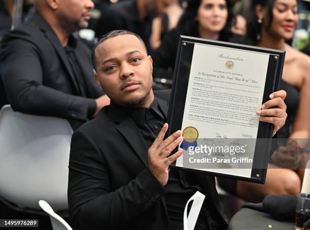 Rapper Shad "Bow Wow" Moss receives a special proclamation award from the Atlanta city council during the 4th Annual Black Music Moguls Brunch at The...