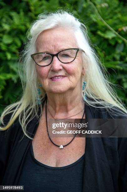 Aneira Thomas poses for a picture in her garden in Swansea on the south coast of Wales on July 3, 2023. Aneira Thomas holds the honour of being the...