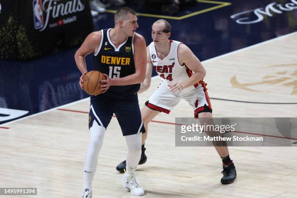 Cody Zeller of the Miami Heat defends against Nikola Jokic of the Denver Nuggets during the second quarter in Game Two of the 2023 NBA Finals at Ball...