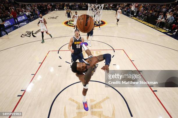 Jeff Green of the Denver Nuggets crashes to the floor under the basket during the first half in Game Two of the 2023 NBA Finals at Ball Arena on June...