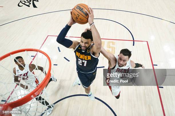 Jamal Murray of the Denver Nuggets drives to the basket against Max Strus of the Miami Heat during the first half in Game Two of the 2023 NBA Finals...