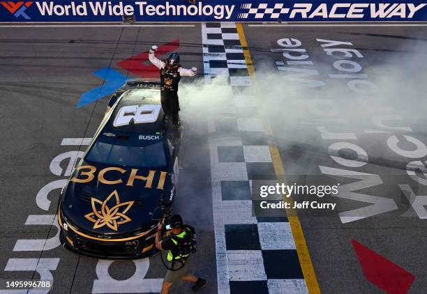 Kyle Busch, driver of the 3CHI Chevrolet, celebrates after winning the NASCAR Cup Series Enjoy Illinois 300 at WWT Raceway on June 04, 2023 in...