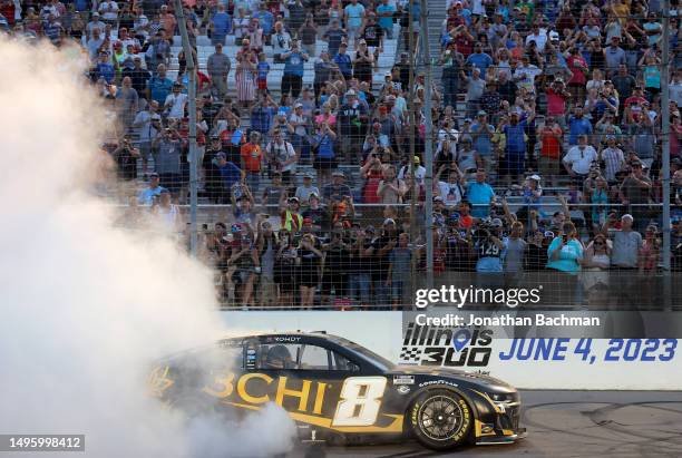 Kyle Busch, driver of the 3CHI Chevrolet, celebrates with a burnout after winning the NASCAR Cup Series Enjoy Illinois 300 at WWT Raceway on June 04,...