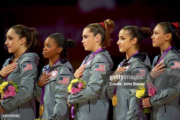 Summer Olympics: Team USA Jordyn Wieber, Gabrielle Douglas, McKayla Maroney, Alexandra Raisman, and Kyla Ross victorious on medal stand after winning...