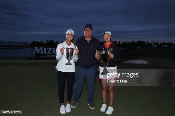 Yana Wilson and Rose Zhang of the United States pose with their trophies after the final round of the Mizuho Americas Open at Liberty National Golf...