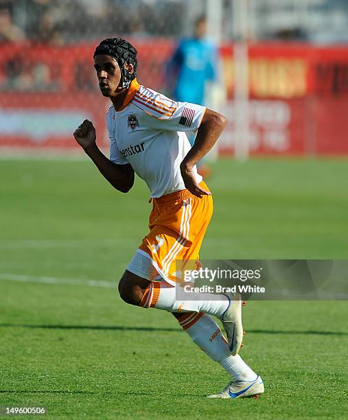 Calen Carr of the Houston Dynamo runs during MLS game action against the Toronto FC July 28, 2012 at BMO Field in Toronto, Ontario, Canada.