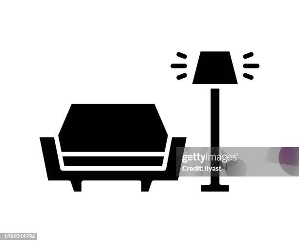 waiting room black filled vector icon - white couch stock illustrations
