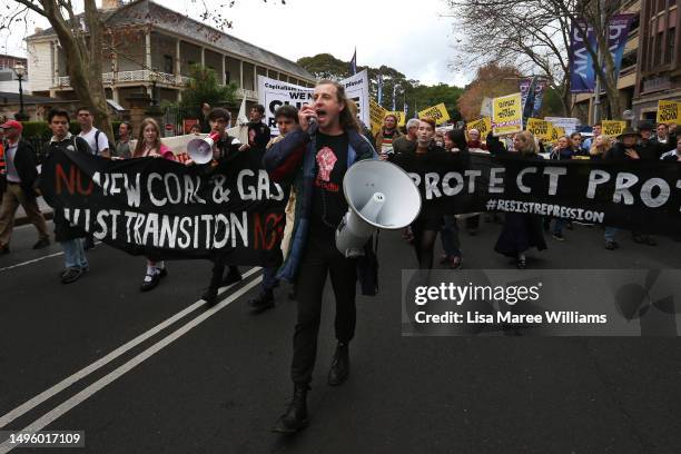 Climate activists march towards NSW Parliament on June 05, 2023 in Sydney, Australia. The rally was held to draw attention to Australia's continued...