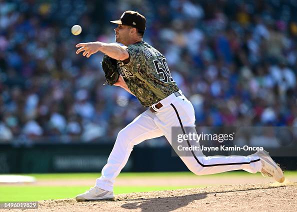 Tom Cosgrove of the San Diego Padres pitches against the Chicago Cubs ...