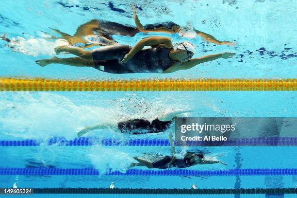 Ranomi Kromowidjojo of Netherlands, Missy Franklin of the United States and Haruka Ueda of Japan compete in heat 7 of the Women's 100m Freestyle on...