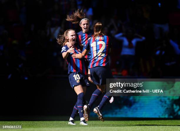 Patri Guijarro of FC Barcelona celebrates with teammates after scoring the team's first goal during the UEFA Women's Champions League final match...