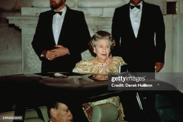 Queen Elizabeth II arrives for Constantine II of Greece’s 50th birthday party, London, June 3rd 1990.