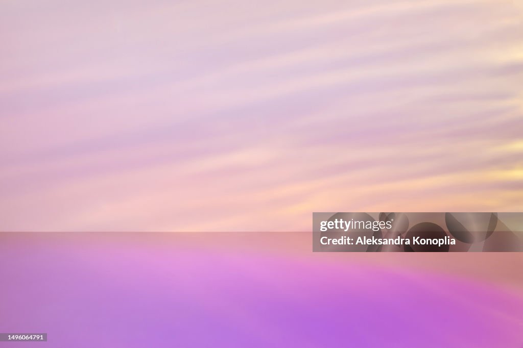 Modern Studio Backdrop - abstract empty stage with dreamy golden caustic light effect on purple background. Pastel holographic neon colors.