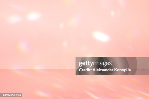 Empty soft pink colored scene - abstract studio room, stage background with crystal rainbow light refraction, disco ball light effects, front view, copy space Empty soft pink colored scene - abstract studio room, stage background with crystal rainbow light refraction, disco ball light effects, front view, copy space
