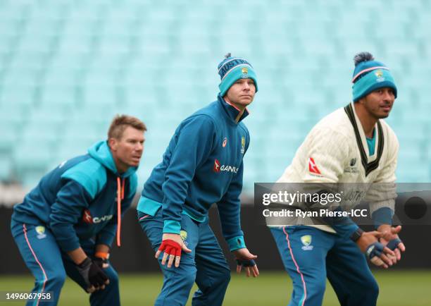 David Warner, Steve Smith and Usman Khawaja of Australia field during Australia training prior to the ICC World Test Championship Final 2023 at The...