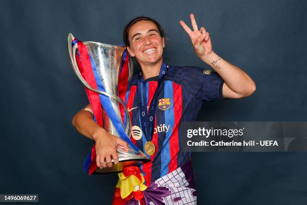 Patri Guijarro of FC Barcelona poses for a photograph with the UEFA Women's Champions League trophy after the UEFA Women's Champions League final...