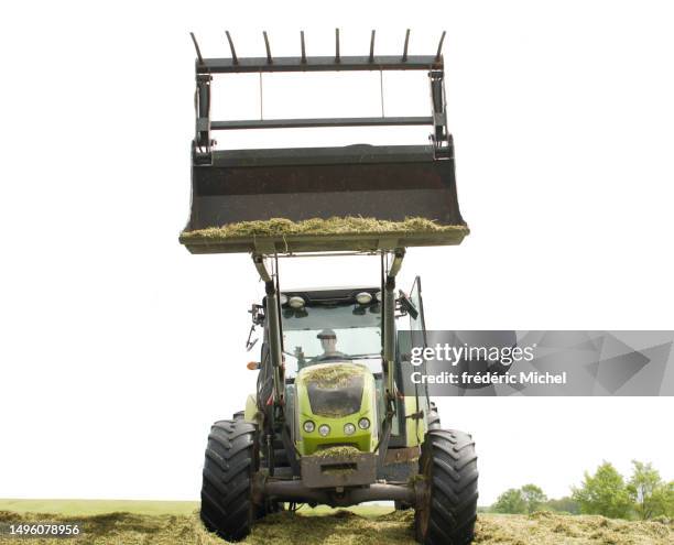 front view tractor with a silage fork and work train - tractor isolated stock pictures, royalty-free photos & images