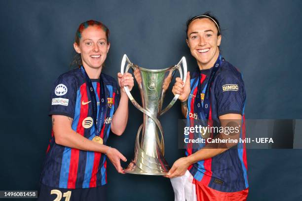 Keira Walsh and Lucy Bronze of FC Barcelona pose for a photograph with the UEFA Women's Champions League trophy after the UEFA Women's Champions...