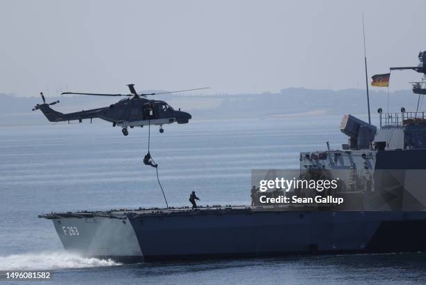 Portuguese Navy special forces abseil onto the corvette Oldenburg in the Baltic Sea during a demonstration of capabilities on June 05, 2023 near...
