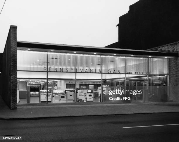 Kitchen appliances on show through the window of the Pennsylvania Gas & Water Company showroom in Williamsport, Pennsylvania, circa 1960.