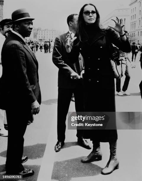 Actress Julie Newmar with Mayor-Commissioner of the District of Columbia, Walter Washington ahead of an anti-Vietnam War peace march, Pennsylvania...