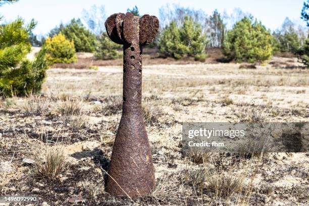 rusty grenade - rocket munition stock pictures, royalty-free photos & images