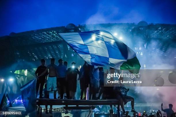 Napoli fans celebrate the victory of the Italian Championship and the Scudetto in front of the Maradona Stadium on June 4, 2023 in Naples, Italy. The...