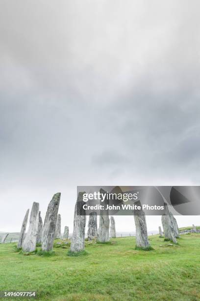 the callanish stones. megalithic standing stones erected 3000 bc. the lewissian gneiss are in a cruciform form with an inner circle. callanish. isle of lewis. the outer hebrides. scotland. - outer hebrides stock pictures, royalty-free photos & images