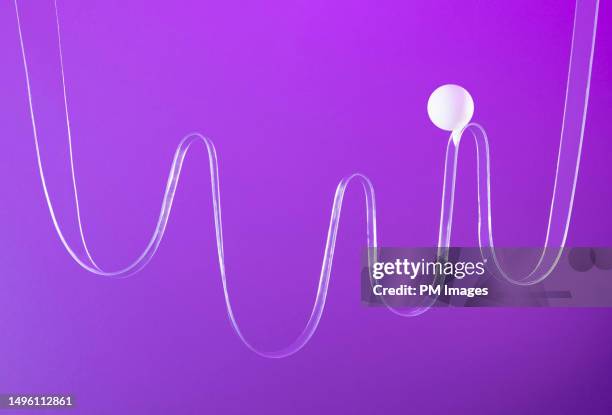 ball riding waves - purple - anticipation rollercoaster stock pictures, royalty-free photos & images