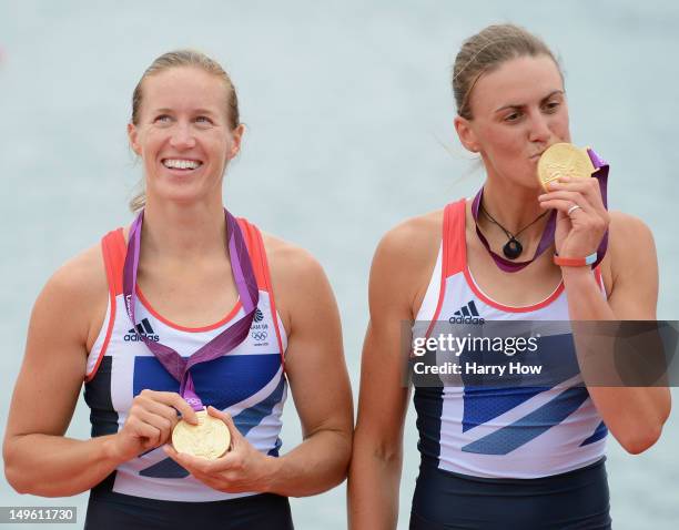 Helen Glover and Heather Stanning of Great Britain celebrate with their gold medals during the medal ceremony after the Women's Pair Final A on Day 5...