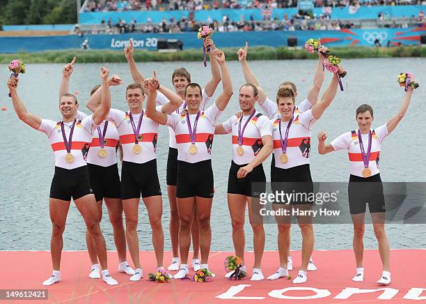 The Germany team celebrate with their medals after winning gold in the Men's Eight Final on Day 5 of the London 2012 Olympic Games at Eton Dorney on...