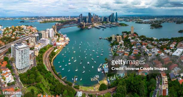 panorama aerial view scene of lavender bay, sydney harbour bridge, circular quay and sydney daring habor office and luxury building group - darling harbor photos et images de collection
