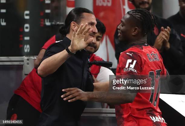 Rafael Leao of AC Milan celebrates with team mate Zlatan Ibrahimovic after scoring their sides second goal during the Serie A match between AC Milan...