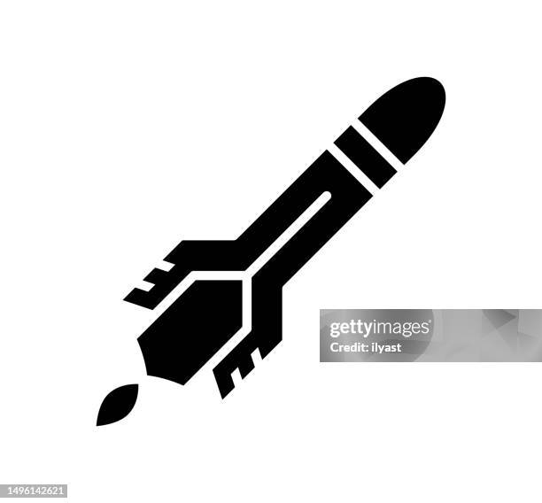 rocket black filled vector icon - missile stock illustrations
