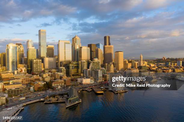 aerial seattle dusk waterfront skyline and wheel - pacific northwest stock pictures, royalty-free photos & images