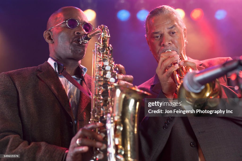 Musicians playing in jazz band on stage