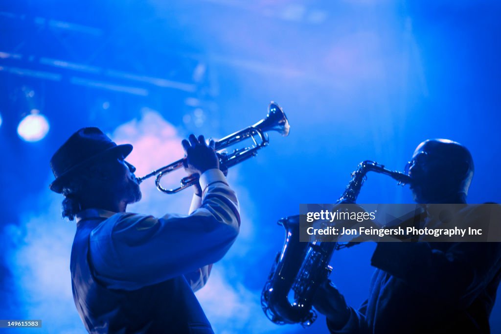 Musicians playing in jazz band on stage