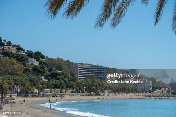 General view of Playa La Caleta beach on a sunny clear blue sky day on April 20, 2023 in Malaga, Spain.