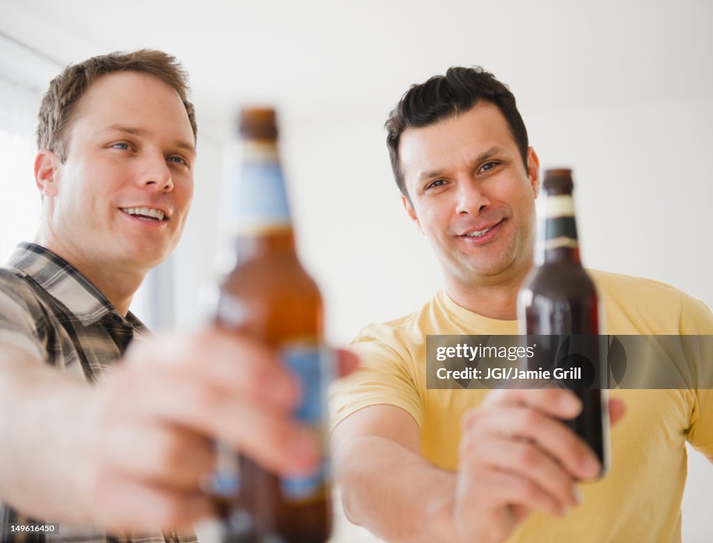 Men toasting together with beer