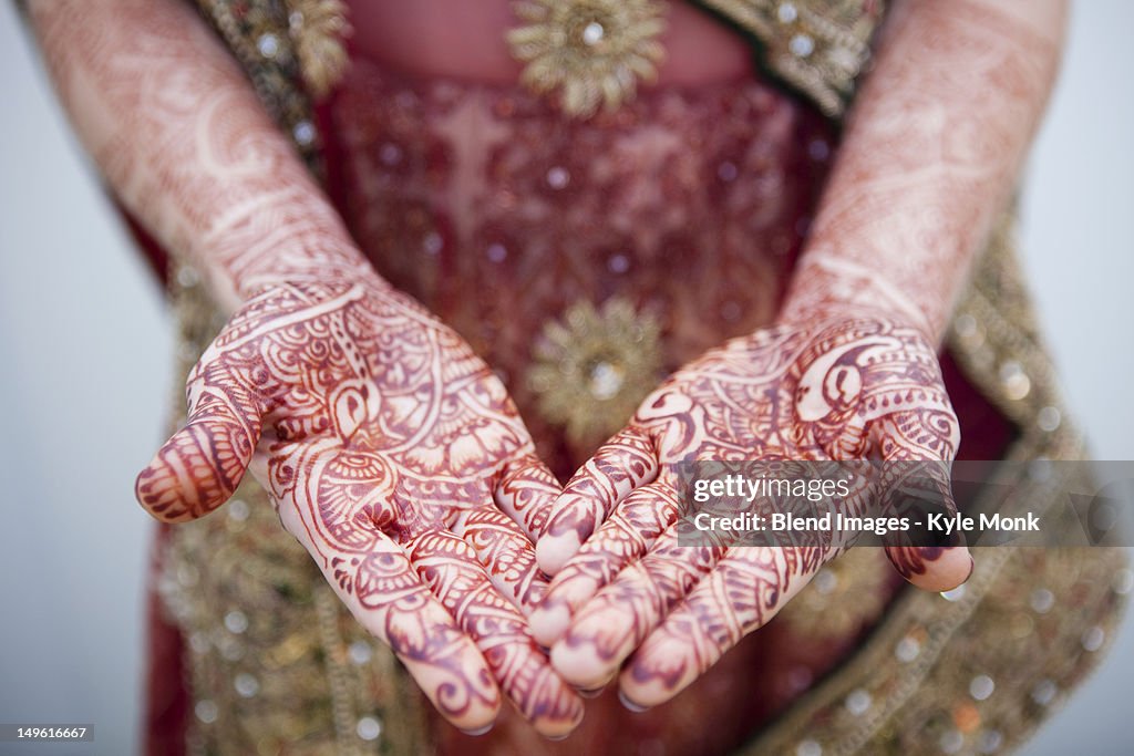 Caucasian woman with Indian henna tattoos on her hands