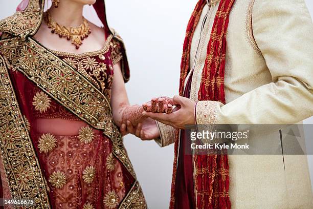 bride and groom in traditional indian wedding clothing - europe bride bildbanksfoton och bilder