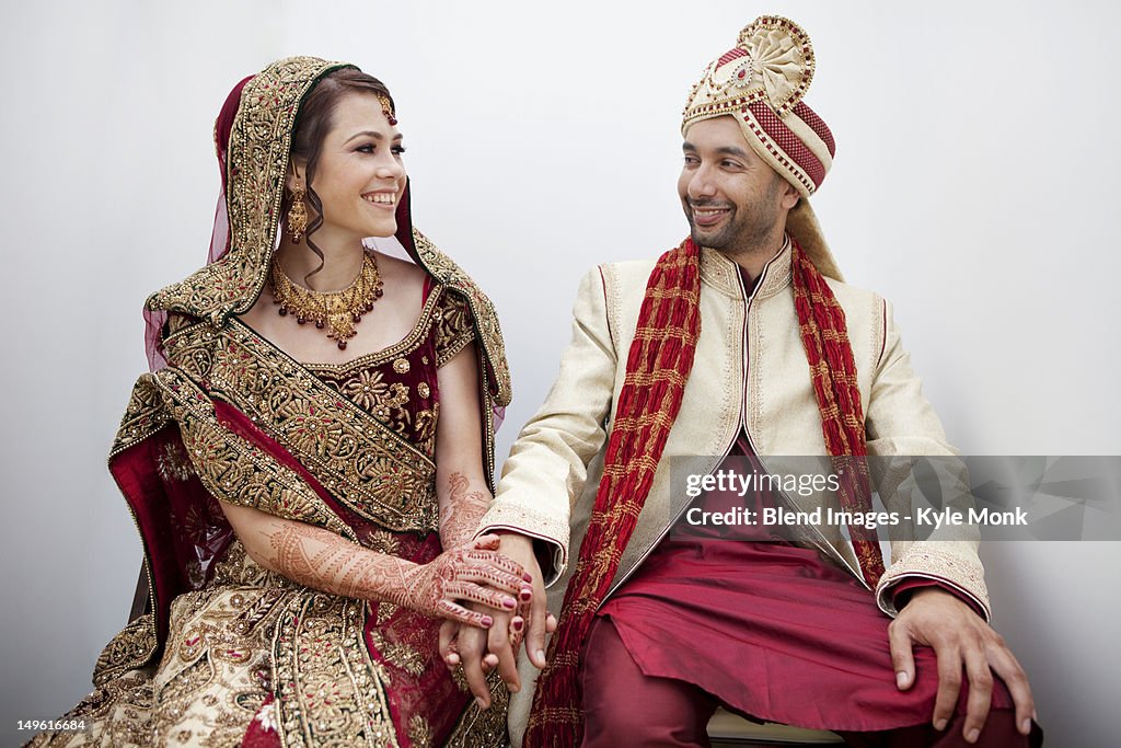 Bride and groom in traditional Indian wedding clothing