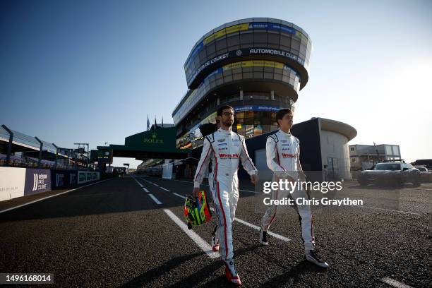 Jack Aitken and Alexander Sims of the No. 31 Whelen Engineering Racing Cadillac V-Series.R walk down pit lane during practice for the 100th...