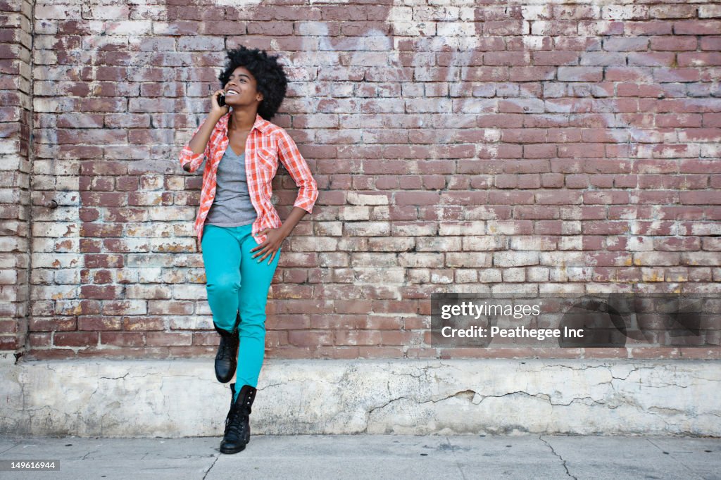 Black woman talking on cell phone