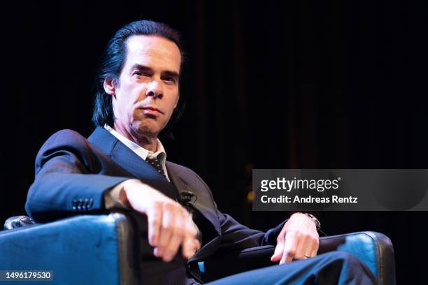 Musician and author Nick Cave gestures during lit.COLOGNE Spezial: Nick Cave & Seán O'Hagan: „Faith, Hope and Carnage" at Theater am Tanzbrunnen on...