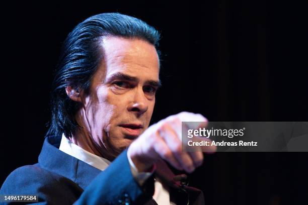 Musician and author Nick Cave gestures during lit.COLOGNE Spezial: Nick Cave & Seán O'Hagan: „Faith, Hope and Carnage" at Theater am Tanzbrunnen on...