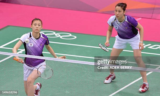 This picture taken on July 31, 2012 shows Kim Ha Na and Jung Kyung Eun of South Korea playing a shot during their women's doubles badminton match...